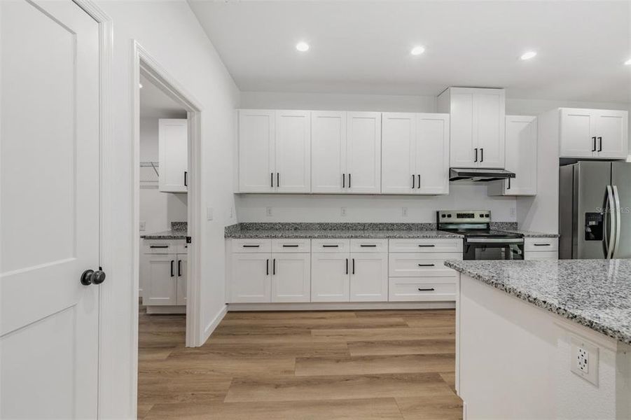 Furnished interior view inside a new home in , Dade City (Image 6).