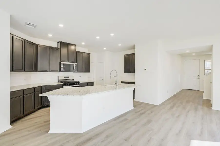 Furnished interior view inside a new home in Salerno - Heritage Collection, Round Rock (Image 9). Furnished interior view inside a new home in Salerno - Heritage Collection, Round Rock (Image 9).