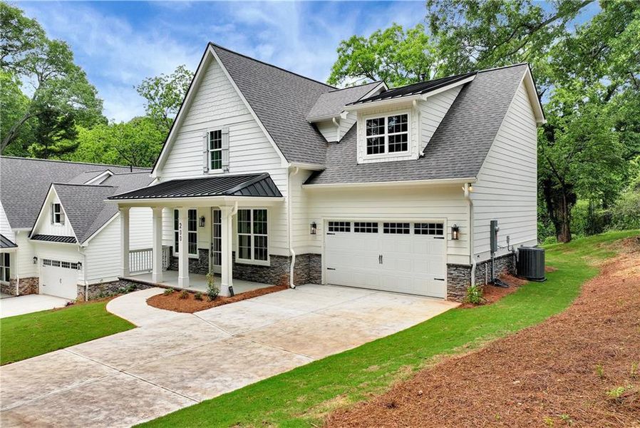Front exterior of a new home in , Commerce, GA, highlighting curb appeal (Image 23).