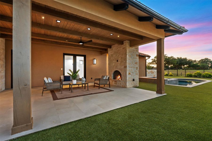 Huge covered patio off family room & primary bedroom. Gorgeous rock fireplace & plenty of space to relax & entertain near the custom pool/spa & backyard area overlooking the golf course.