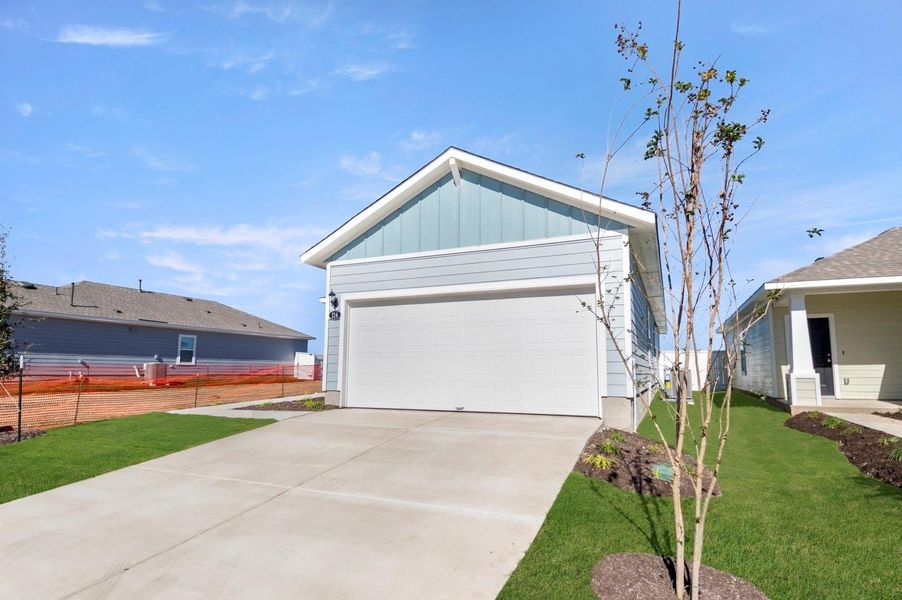 Front exterior of a new home in Harvest Ridge, Elgin, TX, highlighting curb appeal (Image 23).