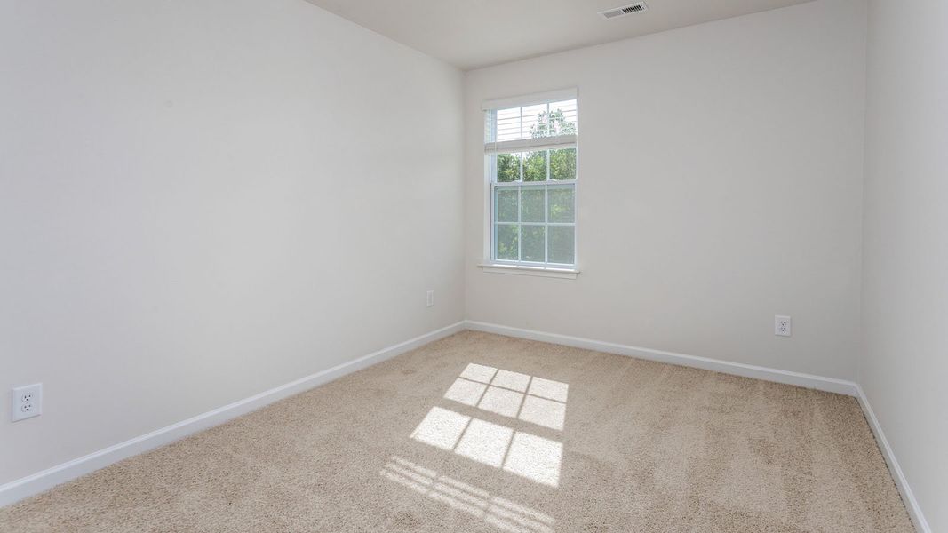 Representative unfurnished interior of a home built from the NEWTON by D.R. Horton in Henley Ridge, Graham (Image 16).