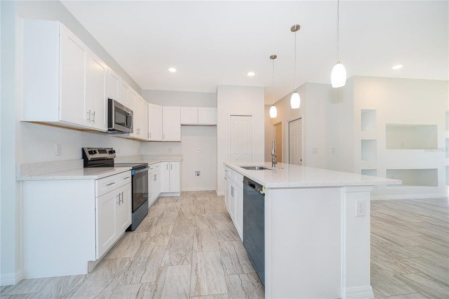 Furnished interior view inside a new home in , Kissimmee (Image 8). Furnished interior view inside a new home in , Kissimmee (Image 8).