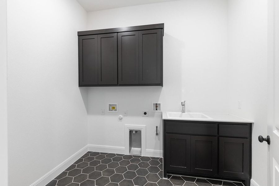 Furnished interior view inside a new home in The Hollows Canyon - 60', Lago Vista (Image 8).