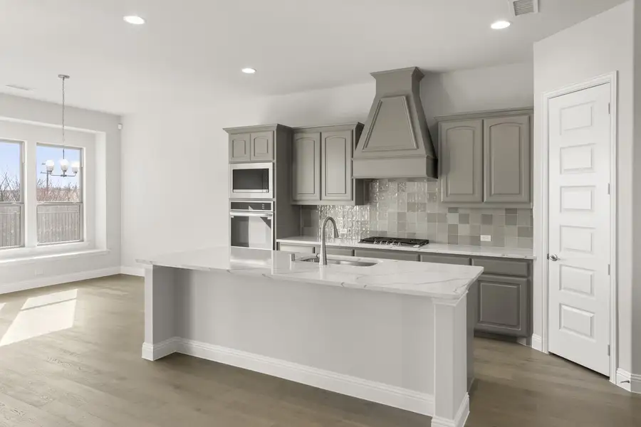 Representative furnished interior of a home built from the Sherman by Windsor Homes in Anna Town Square, Anna (Image 5).