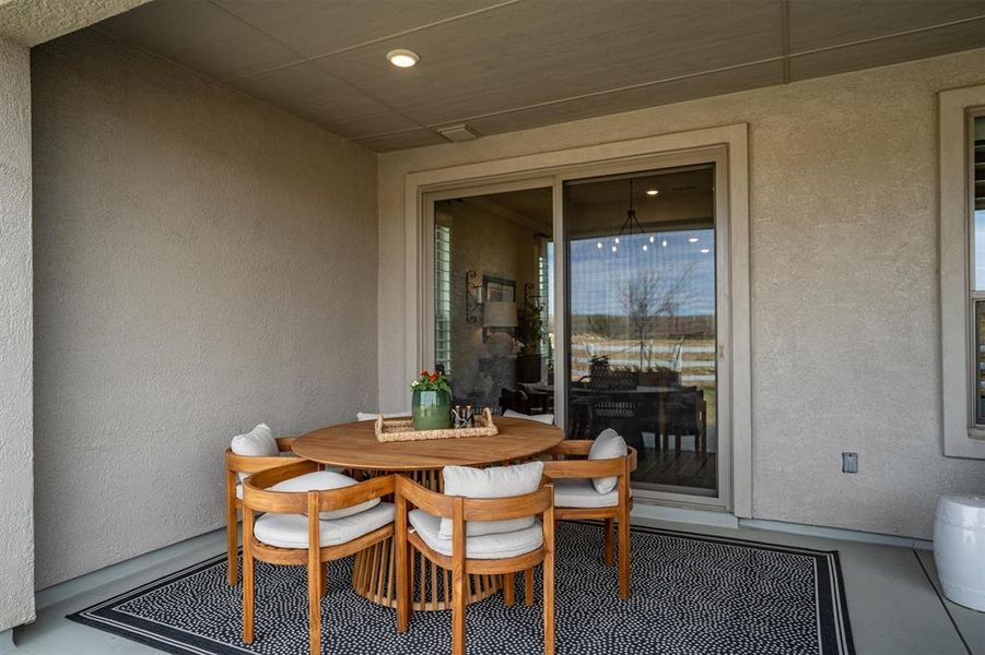 Exterior details and patio area of a home in Robson Ranch Texas, Denton (Image 25).