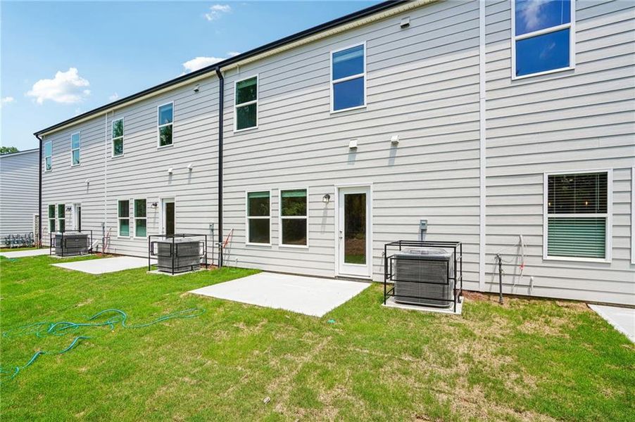 Exterior details and patio area of a home in Artisan Walk, Fairburn (Image 23).