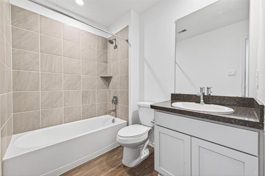 Furnished interior view inside a new home in Breckenridge Forest, Spring (Image 8).