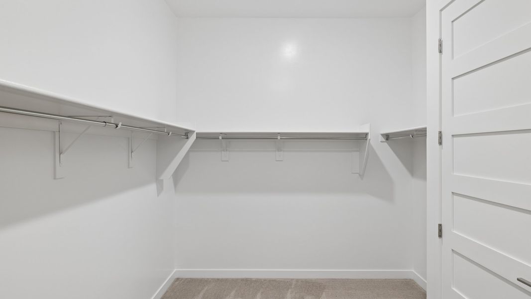 Spacious, unfurnished interior of a new home in The Ridge at Stone Butte, Phoenix (Image 32).