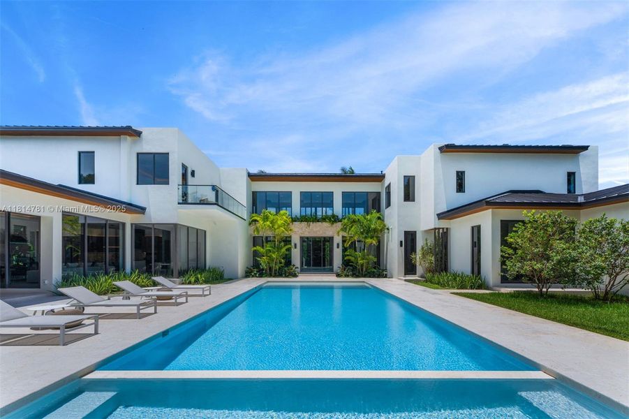 Front exterior of a new home in , Pinecrest, FL, highlighting curb appeal (Image 24).