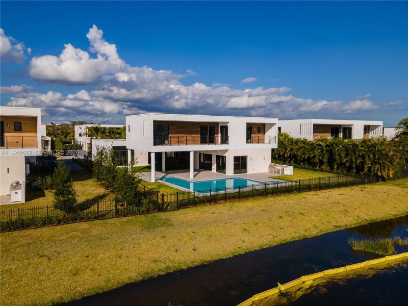 Exterior details and patio area of a home in , Weston (Image 33).
