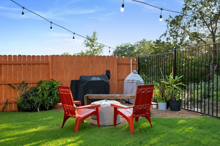 A lawn framed by privacy fencing creates a delightful outdoor relaxation zone. A lawn framed by privacy fencing creates a delightful outdoor relaxation zone.