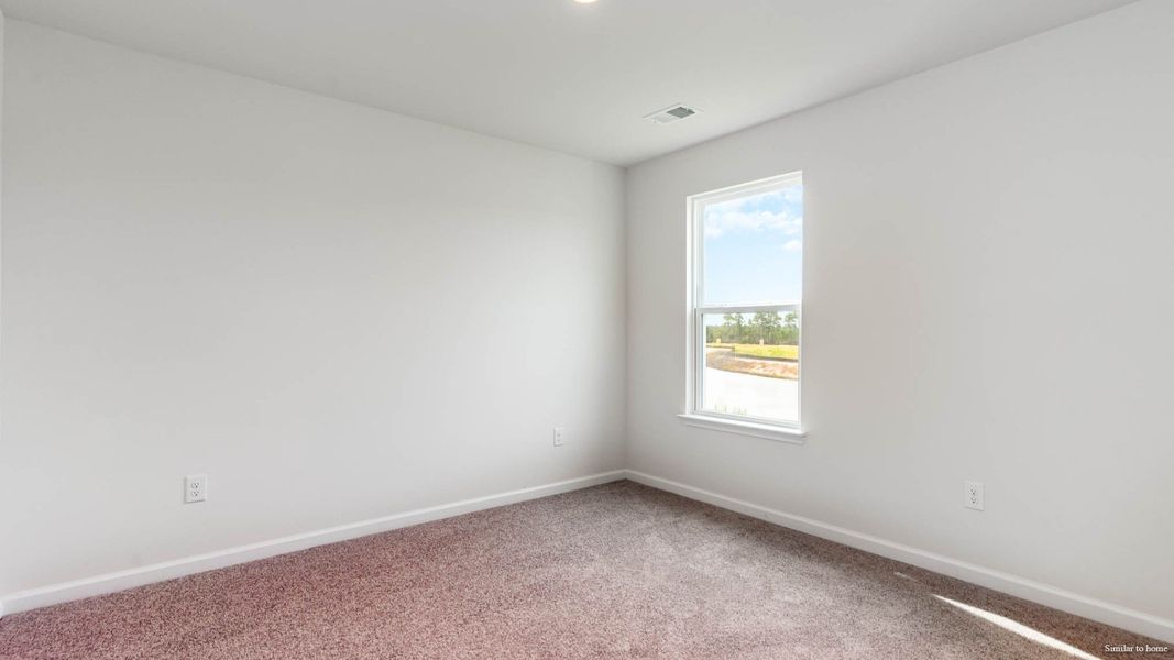 Spacious, unfurnished interior of a new home in Indigo Preserve, Leland (Image 16).