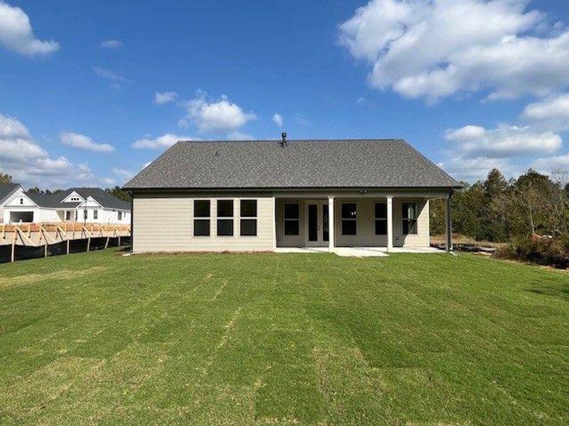 Exterior details and patio area of a home in Soleil Belmont Park, Canton (Image 2). Exterior details and patio area of a home in Soleil Belmont Park, Canton (Image 2).