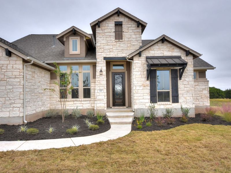 Representative exterior photo of a completed home built from the San Simeon I by Giddens Homes in Clearwater Ranch, Liberty Hill, TX (Image 43).