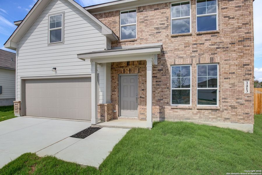Front exterior of a new home in Horizon Pointe, Converse, TX, highlighting curb appeal (Image 38).