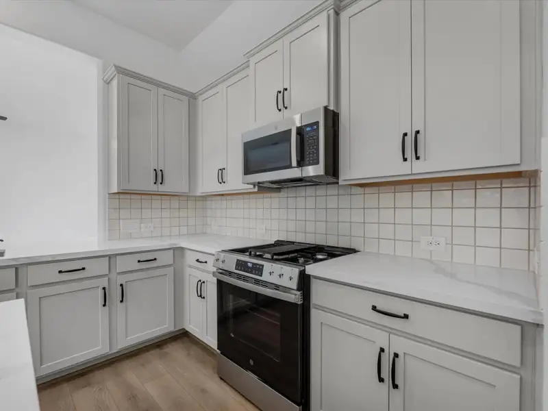 Kitchen. Sample product photo. Actual exterior and interior selections may vary by homesite. Photo may be virtually staged. Kitchen. Sample product photo. Actual exterior and interior selections may vary by homesite. Photo may be virtually staged.