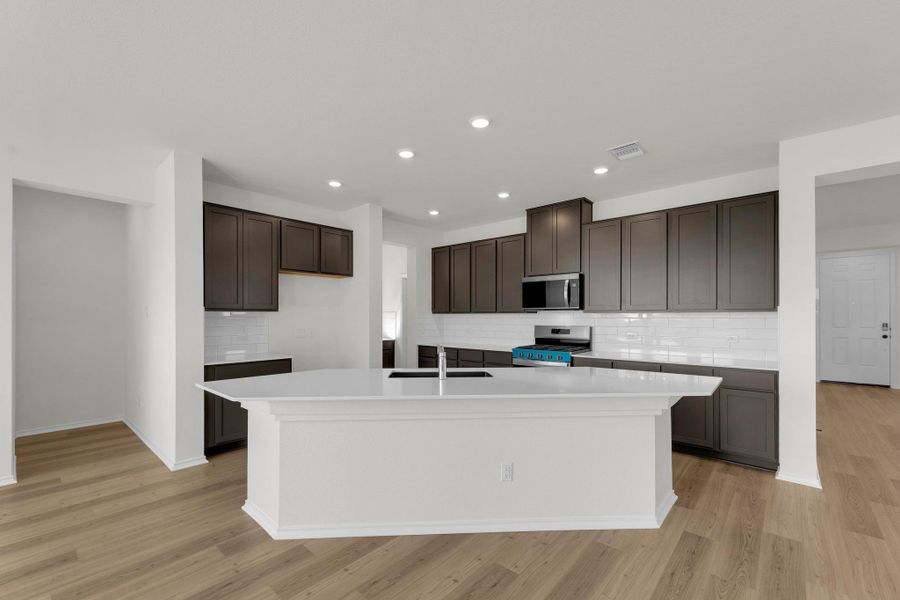 Furnished interior view inside a new home in Salerno - Classic Collection, Round Rock (Image 7). Furnished interior view inside a new home in Salerno - Classic Collection, Round Rock (Image 7).