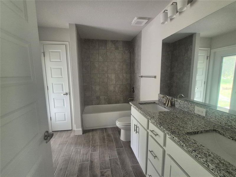 Furnished interior view inside a new home in Hill Country Estates, Dade City (Image 11).