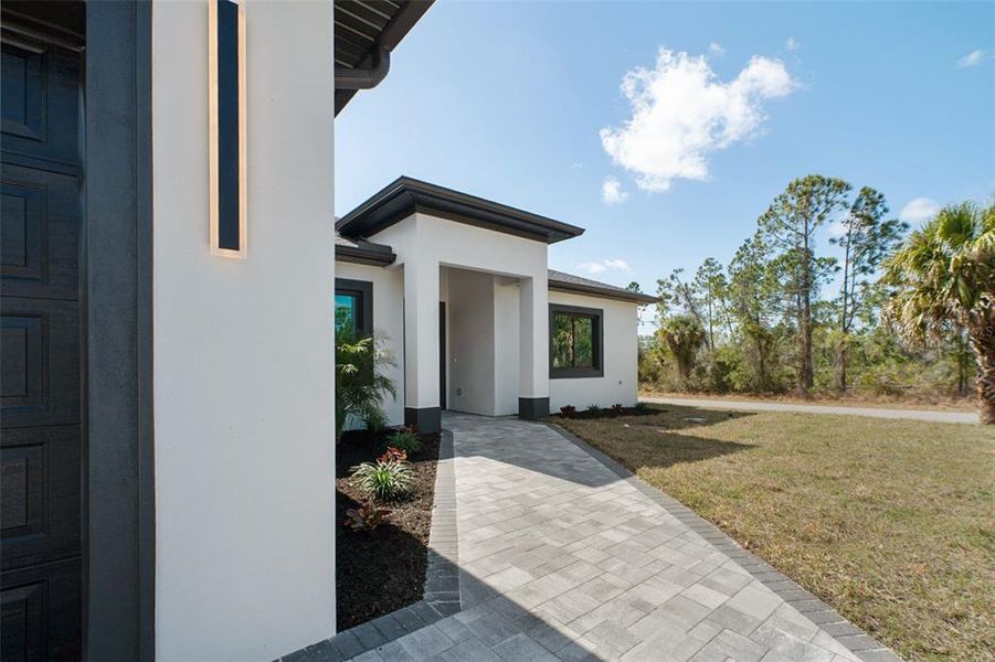 Exterior details and patio area of a home in , North Port (Image 23).