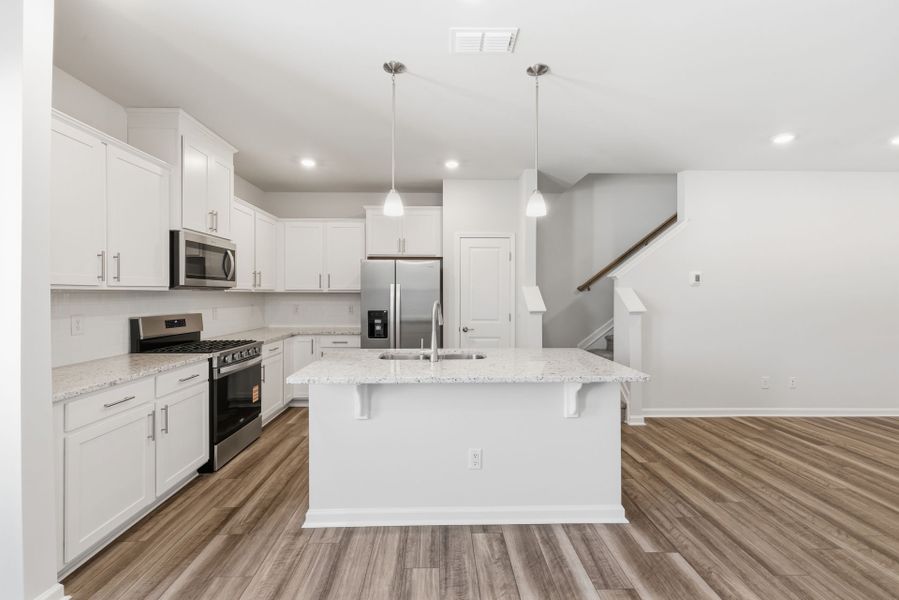 Furnished interior view inside a new home in Poets Walk, Whitsett (Image 12).