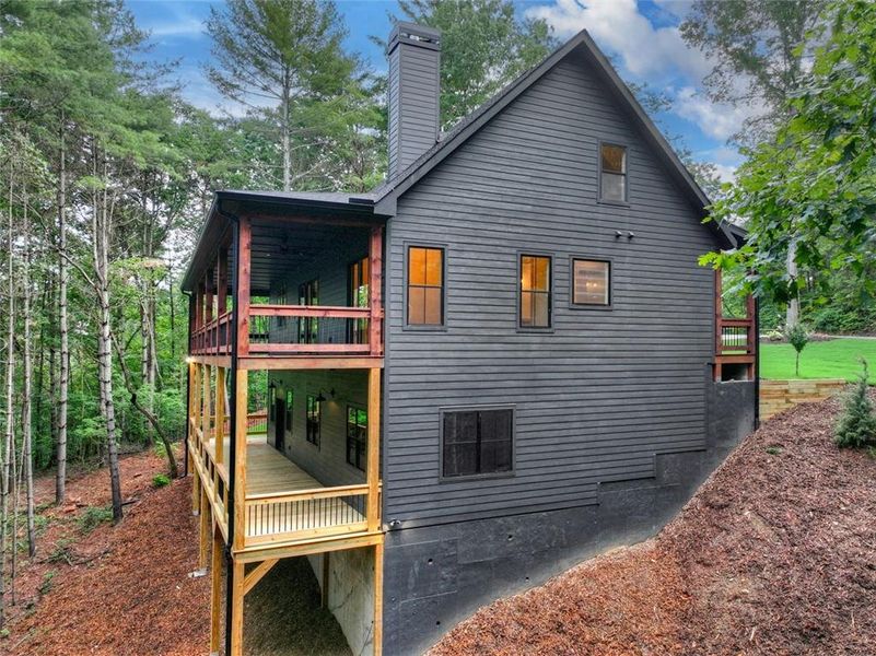 Exterior details and patio area of a home in , Ellijay (Image 37).