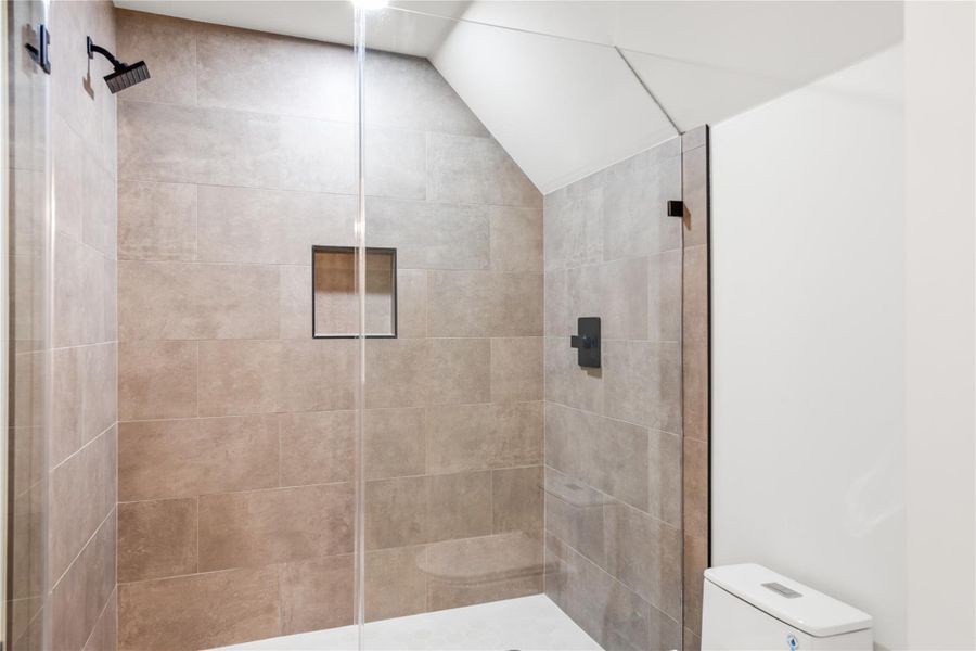 Well-appointed shower in the secondary bathroom.