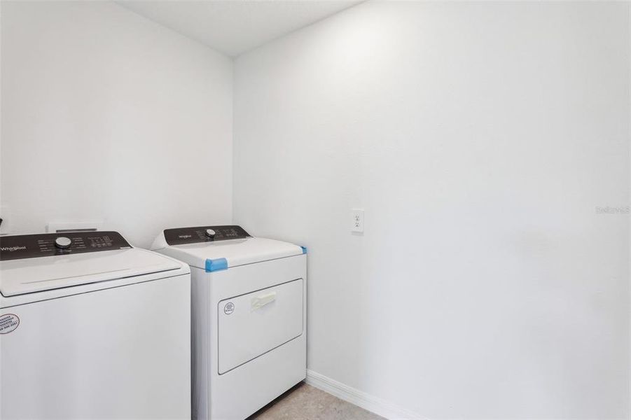 Furnished interior view inside a new home in Lake Deer Estates - Signature Series, Poinciana (Image 6). Furnished interior view inside a new home in Lake Deer Estates - Signature Series, Poinciana (Image 6).