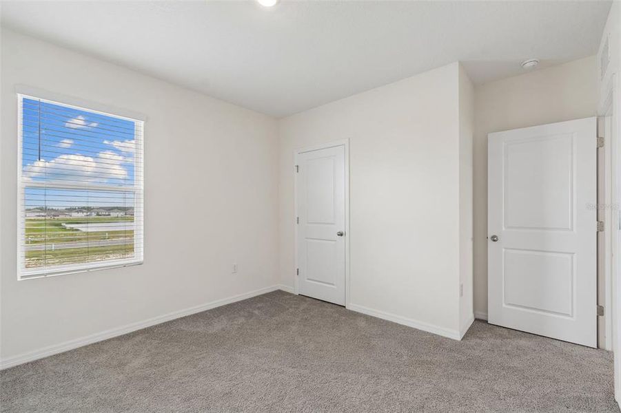Spacious, unfurnished interior of a new home in Epperson, Wesley Chapel (Image 52).