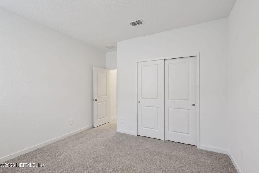 Spacious, unfurnished interior of a new home in Cypress Meadows - Signature Series, Jacksonville (Image 26).