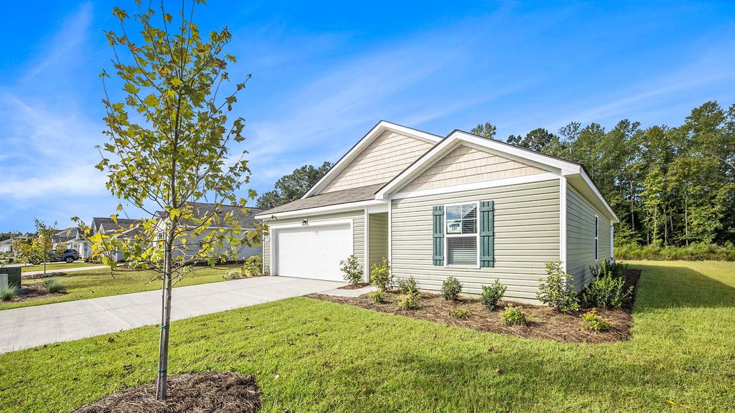 Front exterior of a new home in Eden Springs, Longs, SC, highlighting curb appeal (Image 18).