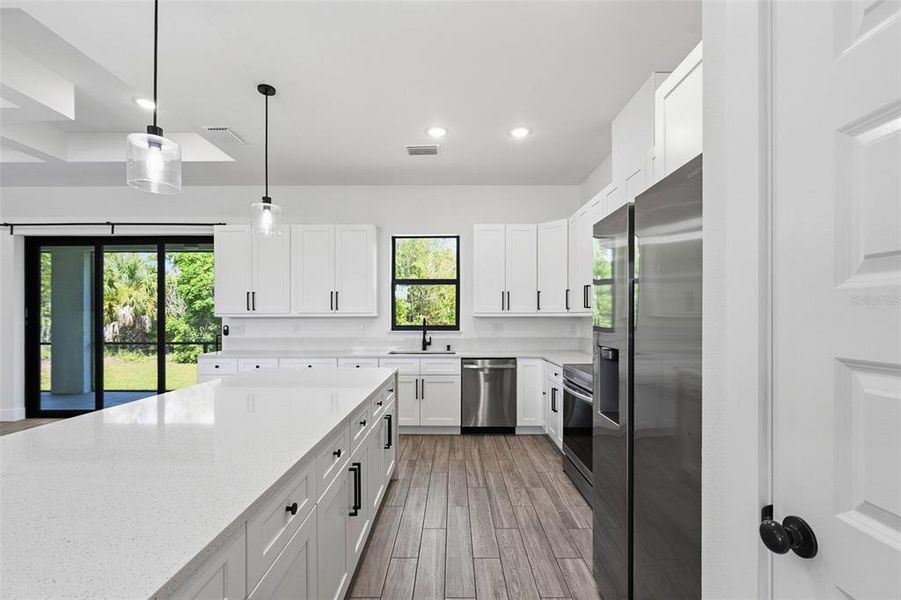 Furnished interior view inside a new home in , Port Charlotte (Image 10).
