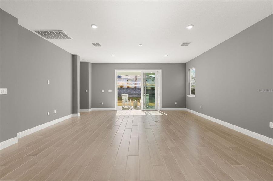 Spacious, unfurnished interior of a new home in Green Key Village, Lady Lake (Image 15).