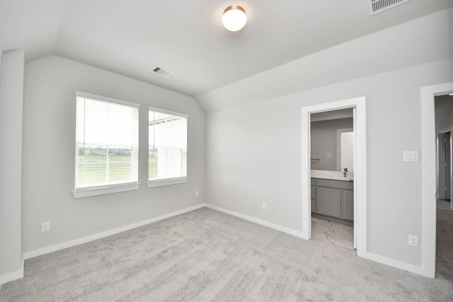 Generously sized secondary bedrooms featuring spacious closets, soft and inviting carpeting underfoot, large windows allowing plenty of natural light, and the added touch of privacy blinds for your personal retreat. Generously sized secondary bedrooms featuring spacious closets, soft and inviting carpeting underfoot, large windows allowing plenty of natural light, and the added touch of privacy blinds for your personal retreat.