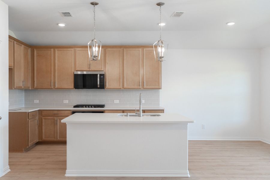 Furnished interior view inside a new home in Lake Pointe, Little Elm (Image 6).