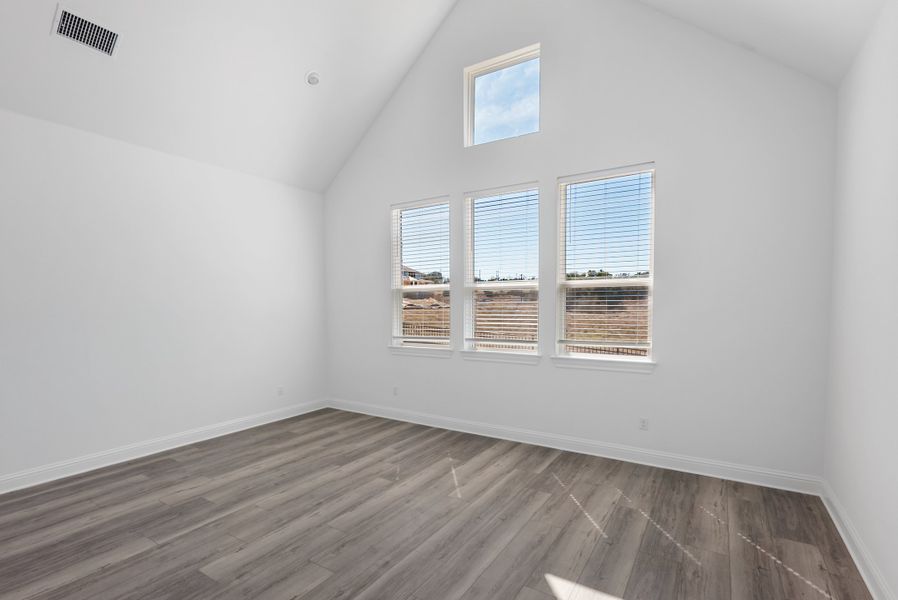 Representative unfurnished interior of a home built from the Hasley by Ashton Woods in The Estates at La Cima, San Marcos (Image 22).