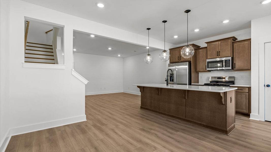 Memorable meals start in this exclusive dining space featuring elegant trim and natural light