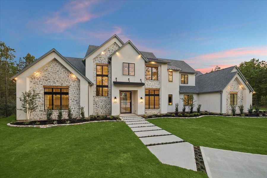 Front exterior of a new home in , Montgomery, TX, highlighting curb appeal (Image 25).