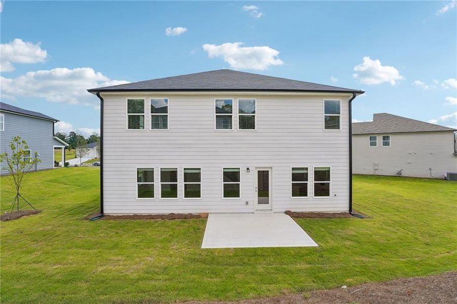Exterior details and patio area of a home in Northwoods at Mirror Lake, Villa Rica (Image 25).