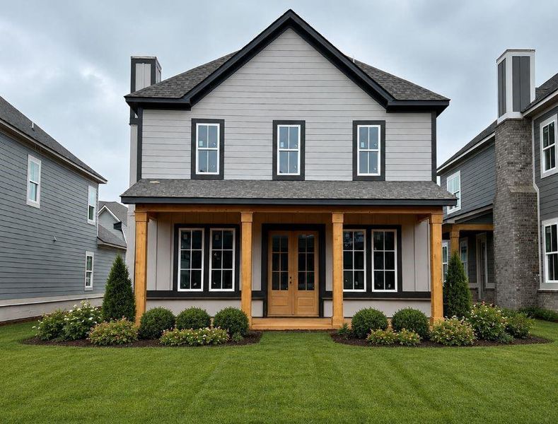 Front exterior of a new home in Trove, Watkinsville, GA, highlighting curb appeal (Image 1). Front exterior of a new home in Trove, Watkinsville, GA, highlighting curb appeal (Image 1).