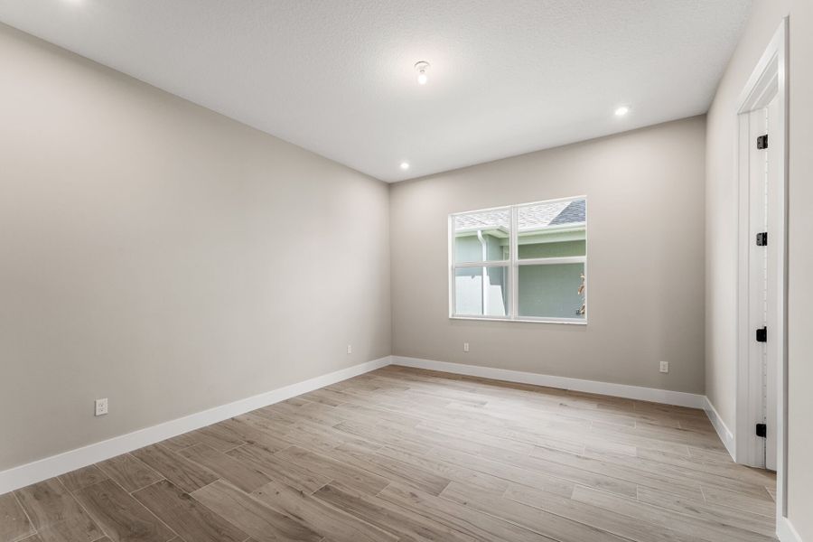 Representative unfurnished interior of a home built from the Monarch by Mattamy Homes in Newfield, Palm City (Image 11).