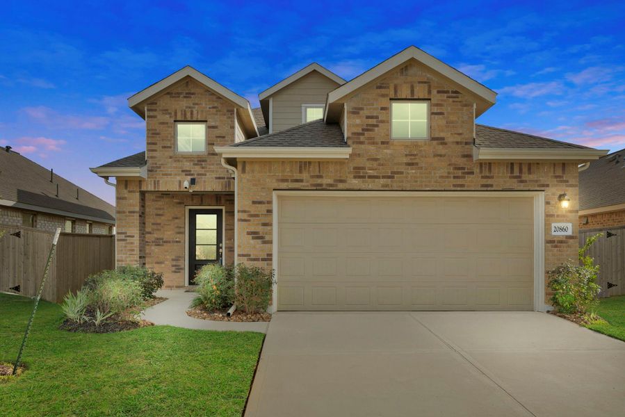 Front exterior of a new home in Tavola: Gulf Coast Collection, New Caney, TX, highlighting curb appeal (Image 1).