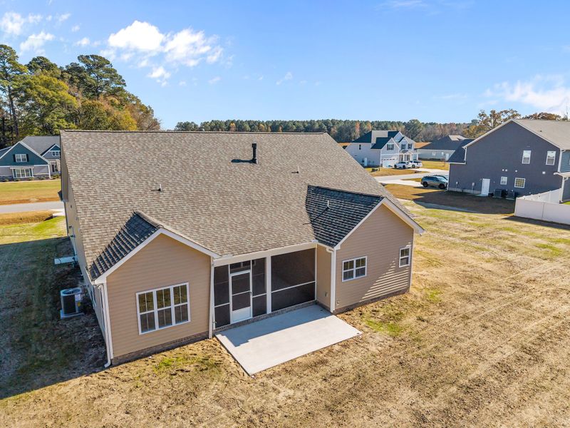 Exterior details and patio area of a home in Kennedy's Crossing, Grimesland (Image 27).