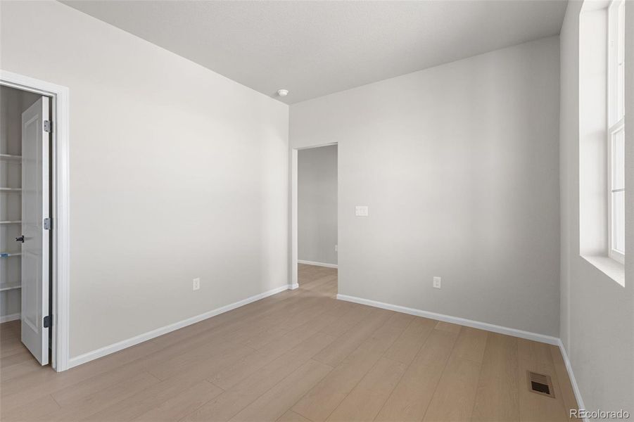 Spacious, unfurnished interior of a new home in The Legacy Collection at Talon Pointe, Thornton (Image 19).