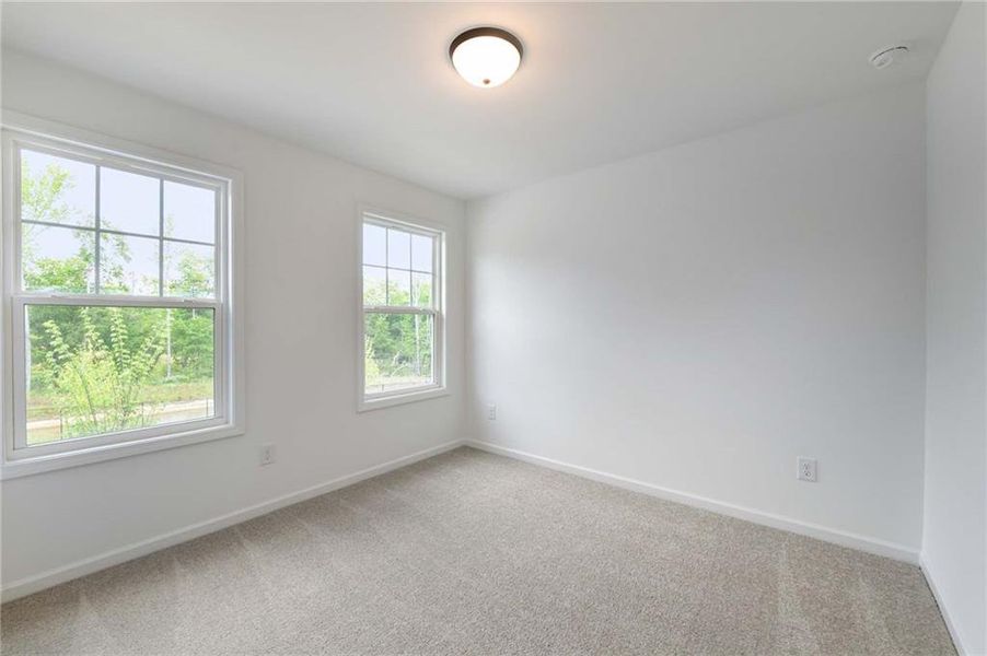 Spacious, unfurnished interior of a new home in Eastlyn Crossing, Flowery Branch (Image 12). Spacious, unfurnished interior of a new home in Eastlyn Crossing, Flowery Branch (Image 12).