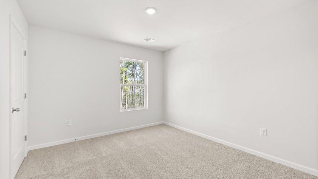 Representative unfurnished interior of a home built from the Hayden by D.R. Horton in Liberty Crossing, Braselton (Image 28).