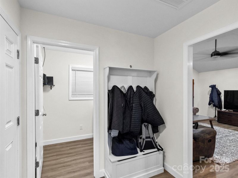 Hallway to Laundry Room & Garage with Entryway / Drop Zone Organizer for Jackets & Bags (which also conveys with the sale)