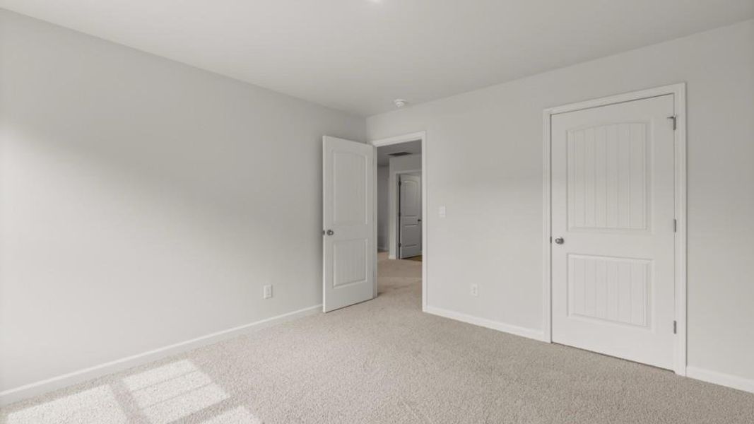 Spacious, unfurnished interior of a new home in Northwoods at Mirror Lake, Villa Rica (Image 28).