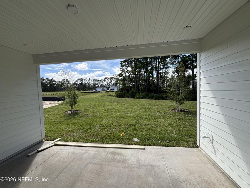Exterior details and patio area of a home in The Cypress Series at Reserve East, Flagler Beach (Image 19).