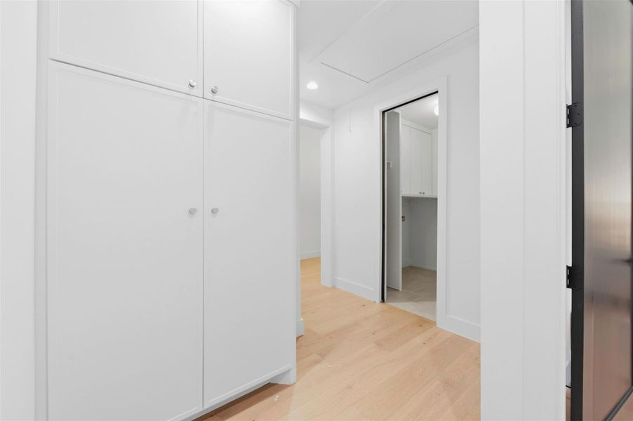 Custom built-ins between the bedrooms provide even more storage, continuing the home’s thoughtfully designed use of space throughout.